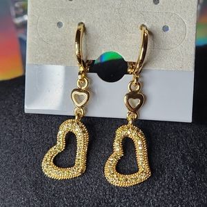 Heart shaped huggie earrings